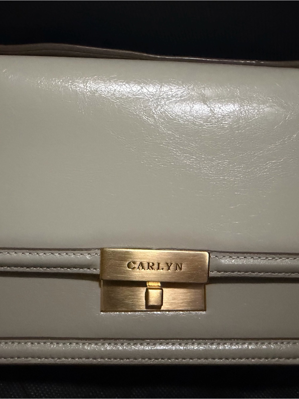 Carlyn Cream Leather Wristlet Clutch with Gold-Tone Lock